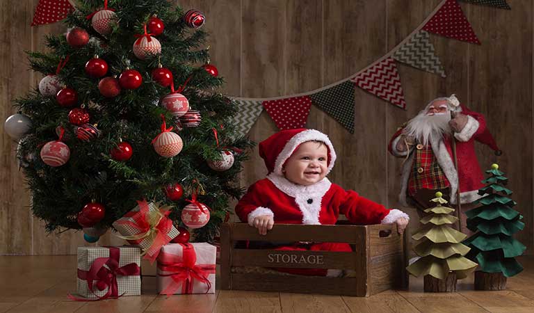 استفاده از کلاه بابانوئل - تم کریسمس برای عکاسی کودک
